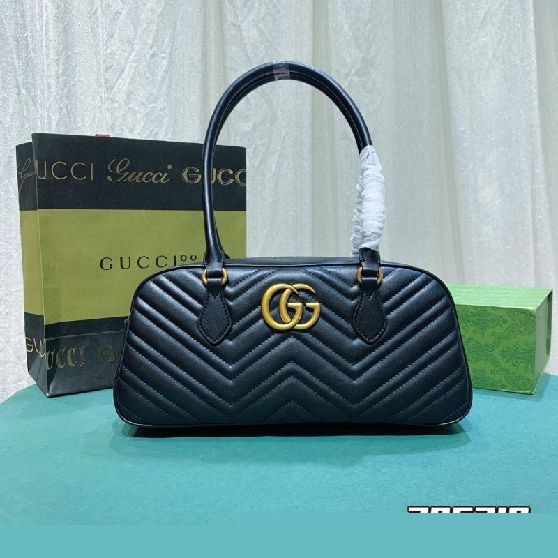 G*u*i top handle bags